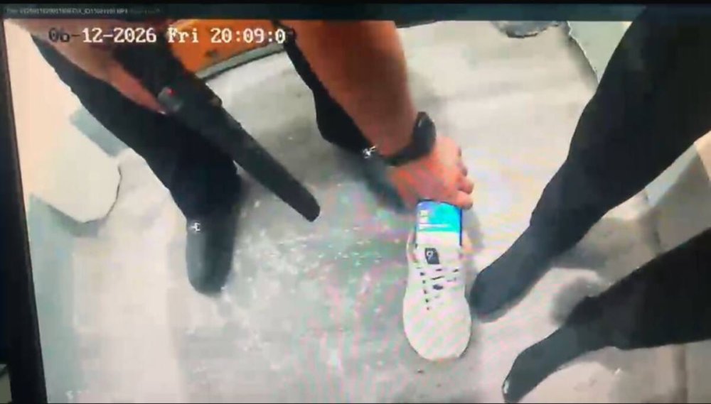 A convict tried to carry a phone in shoes in a minimum security prison facility in the Abai region .