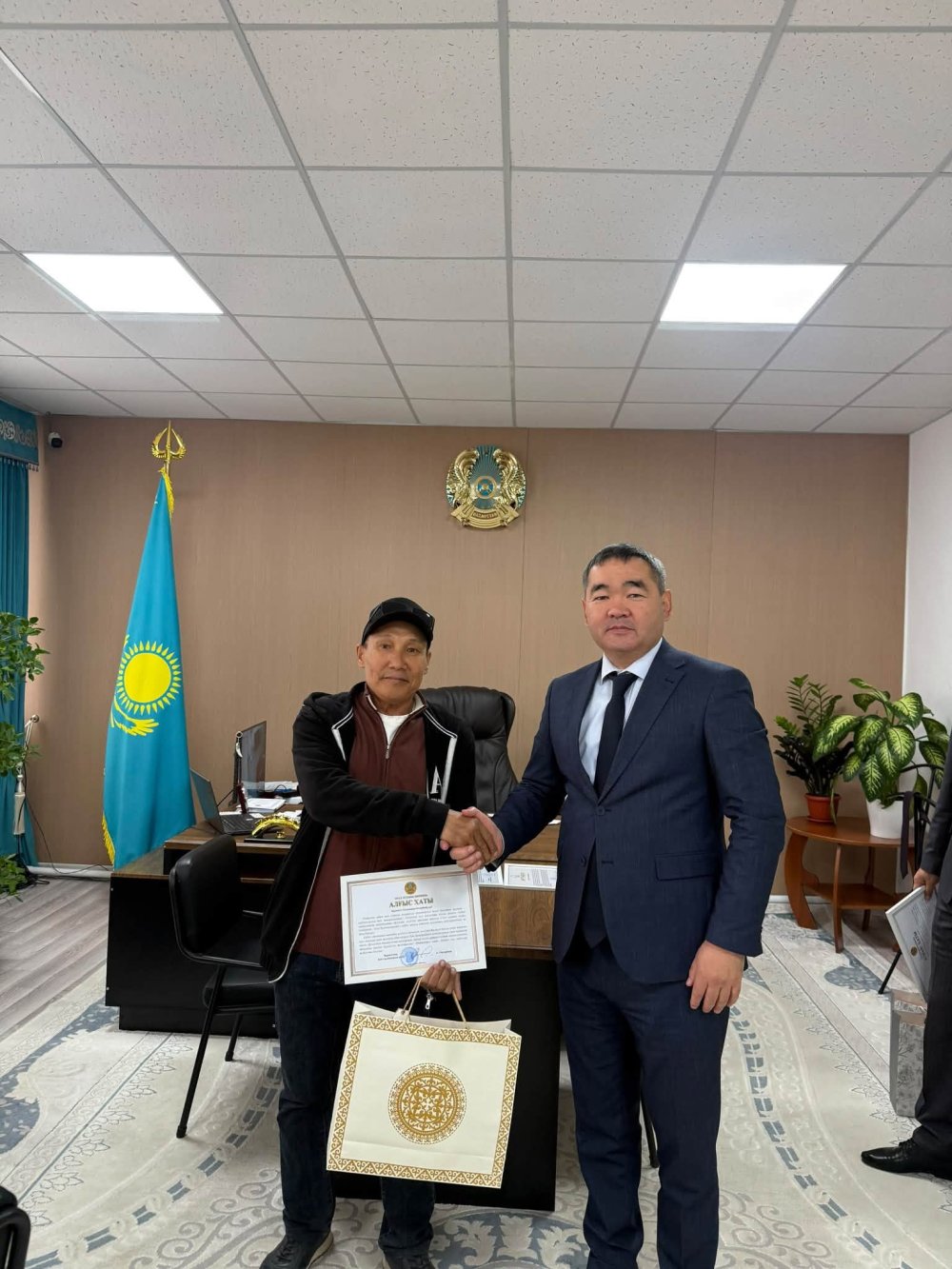ЕҢБЕК КҮНІ МЕРЕКЕСІНЕ ОРАЙ ҚҰРМЕТ КӨРСЕТІЛДІ — Фотосурет 4