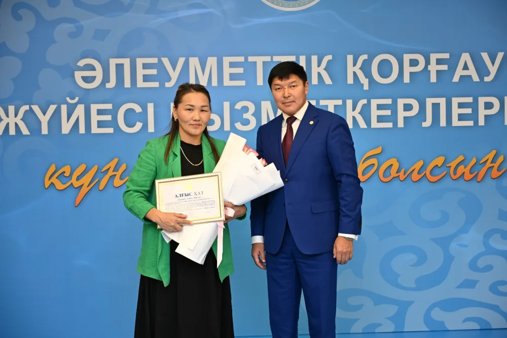 Талдықорғанда әлеуметтік қорғау саласының қызметкерлері марапатталды — Фотосурет 5