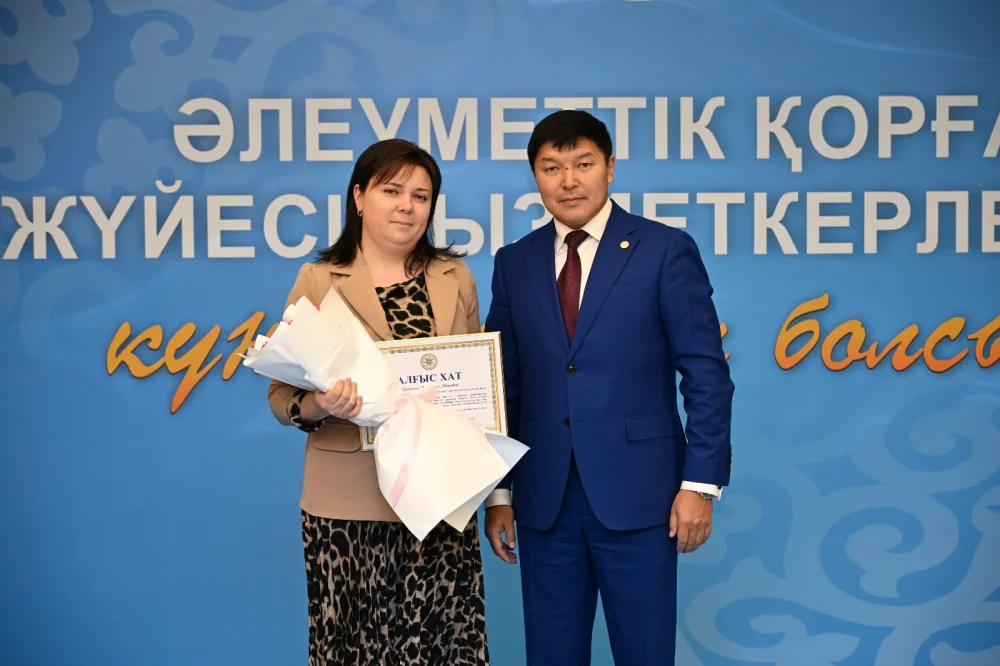 Талдықорғанда әлеуметтік қорғау саласының қызметкерлері марапатталды — Фотосурет 11