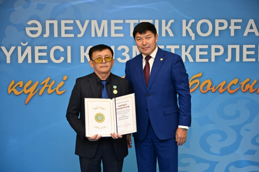 Талдықорғанда әлеуметтік қорғау саласының қызметкерлері марапатталды — Фотосурет 9