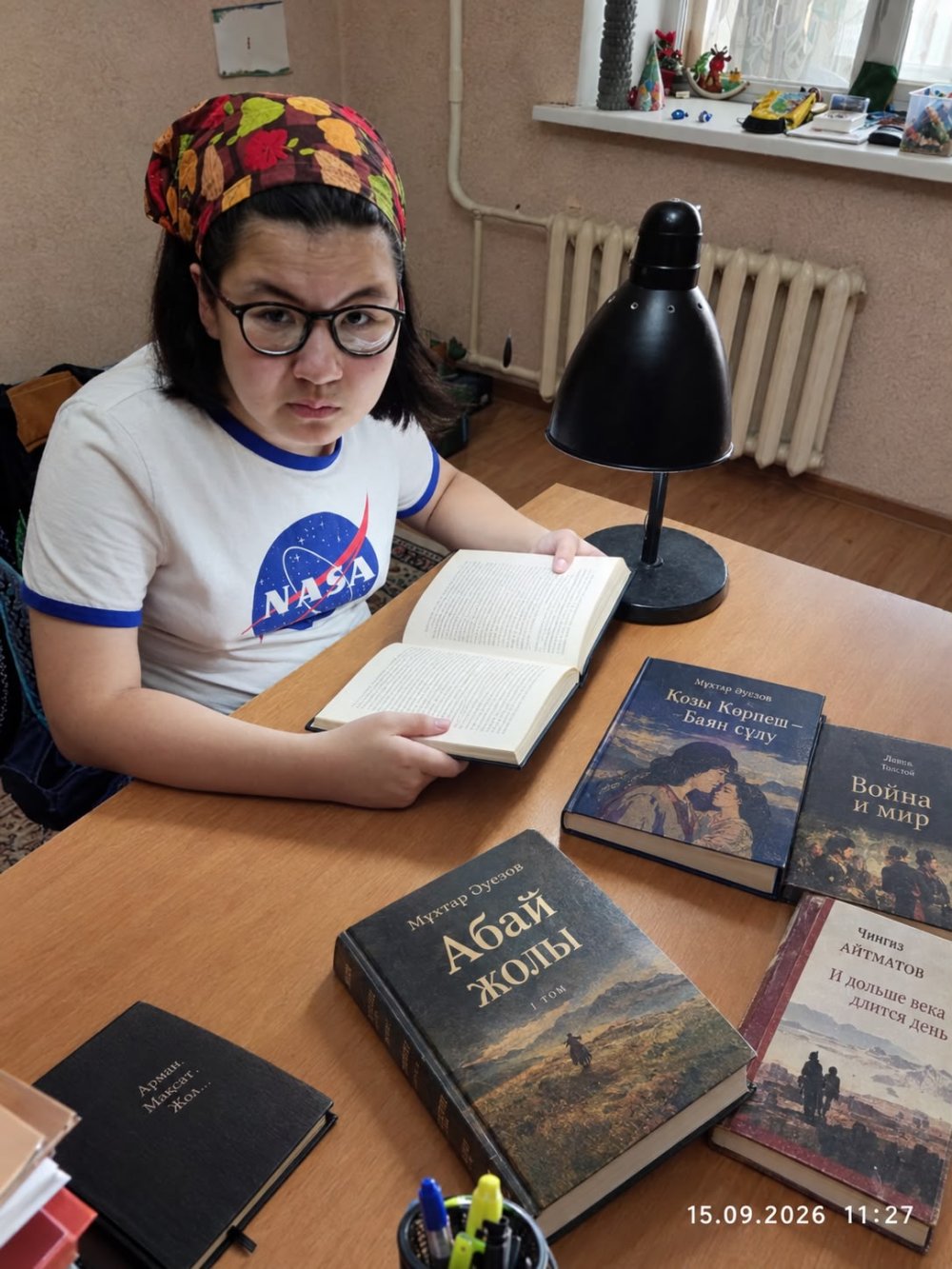 11-летняя особенная школьница из Астаны прочитала сотни книг